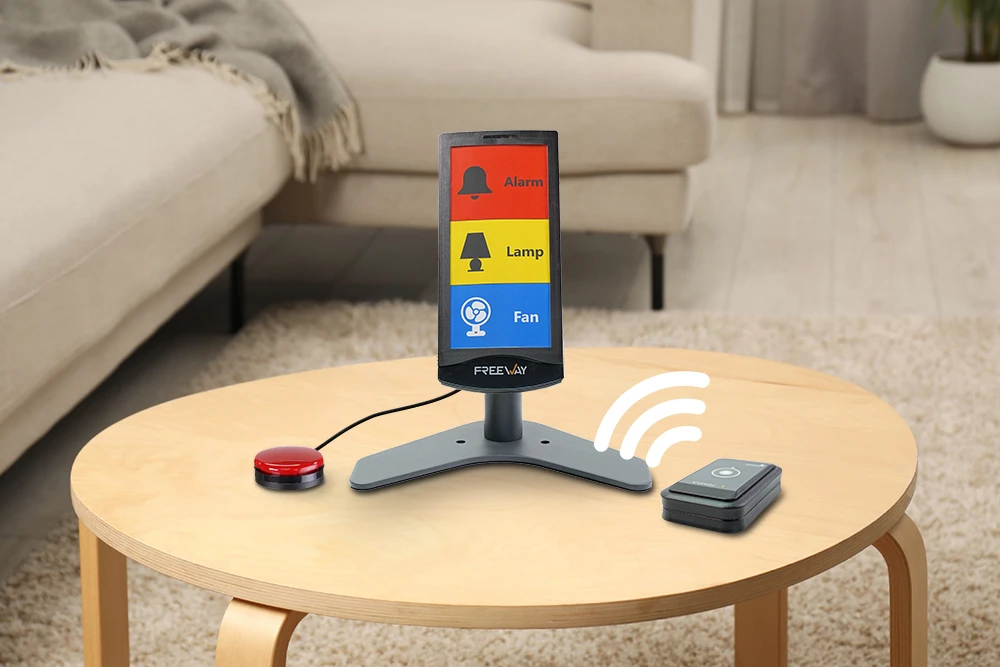 Freeway Assistive Device with Wired and Wireless Switch Control Freeway assistive control device on a table with wired switch and wireless remote switch showing flexible control options
