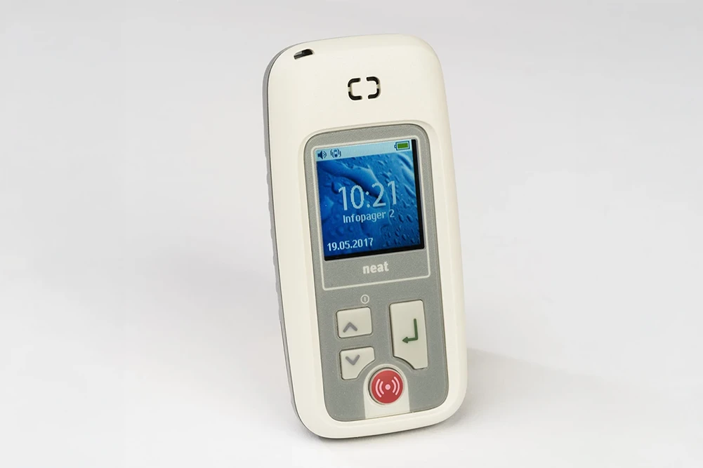 InfoPager handheld pager with a large colour display showing alarm and location information