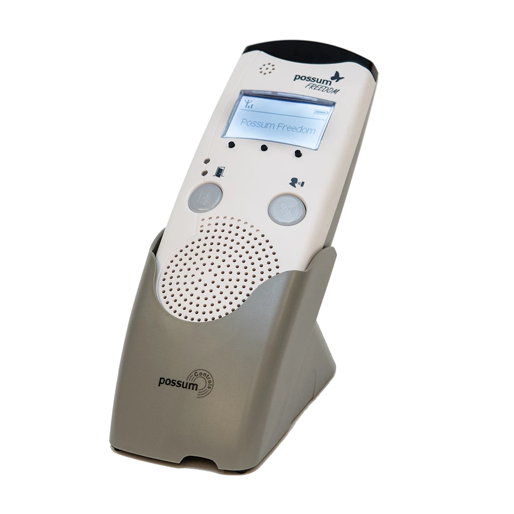 Possum Freedom wireless door entry, intercom and telephone control device in charging cradle