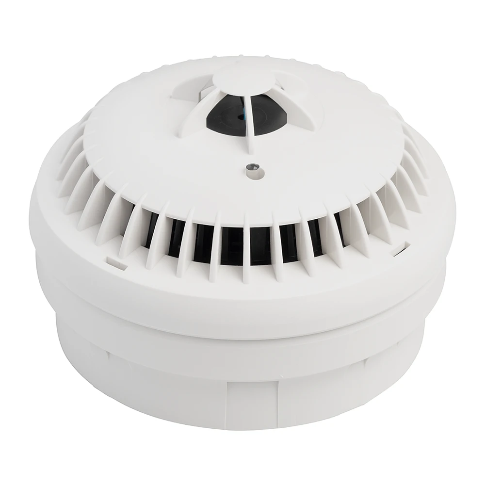 Angled view of Possum wireless heat detector for telecare fire safety monitoring