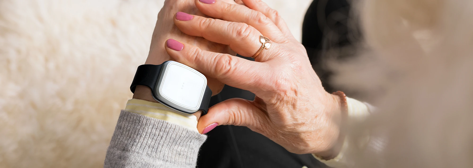 Possum Personal Alarm – Wrist Worn Safety Device person wearing wrist-worn personal alarm for emergency assistance at home