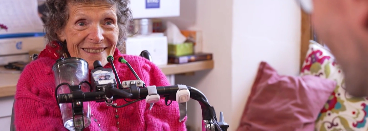 Environmental Control Systems for Independent Living Woman using assistive environmental control technology to support independent living and accessibility needs