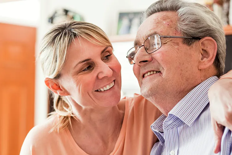 Connected Care at Home Carer providing reassurance and support to an older person at home