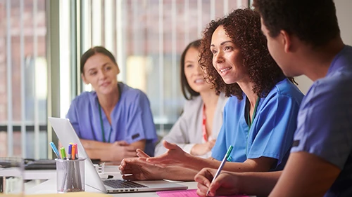 Early Identification of Issues Care professionals reviewing resident information to identify potential risks early