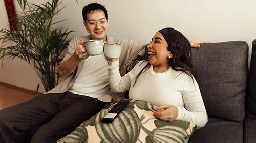 Enhanced Independence Couple relaxing together at home with confidence and independence
