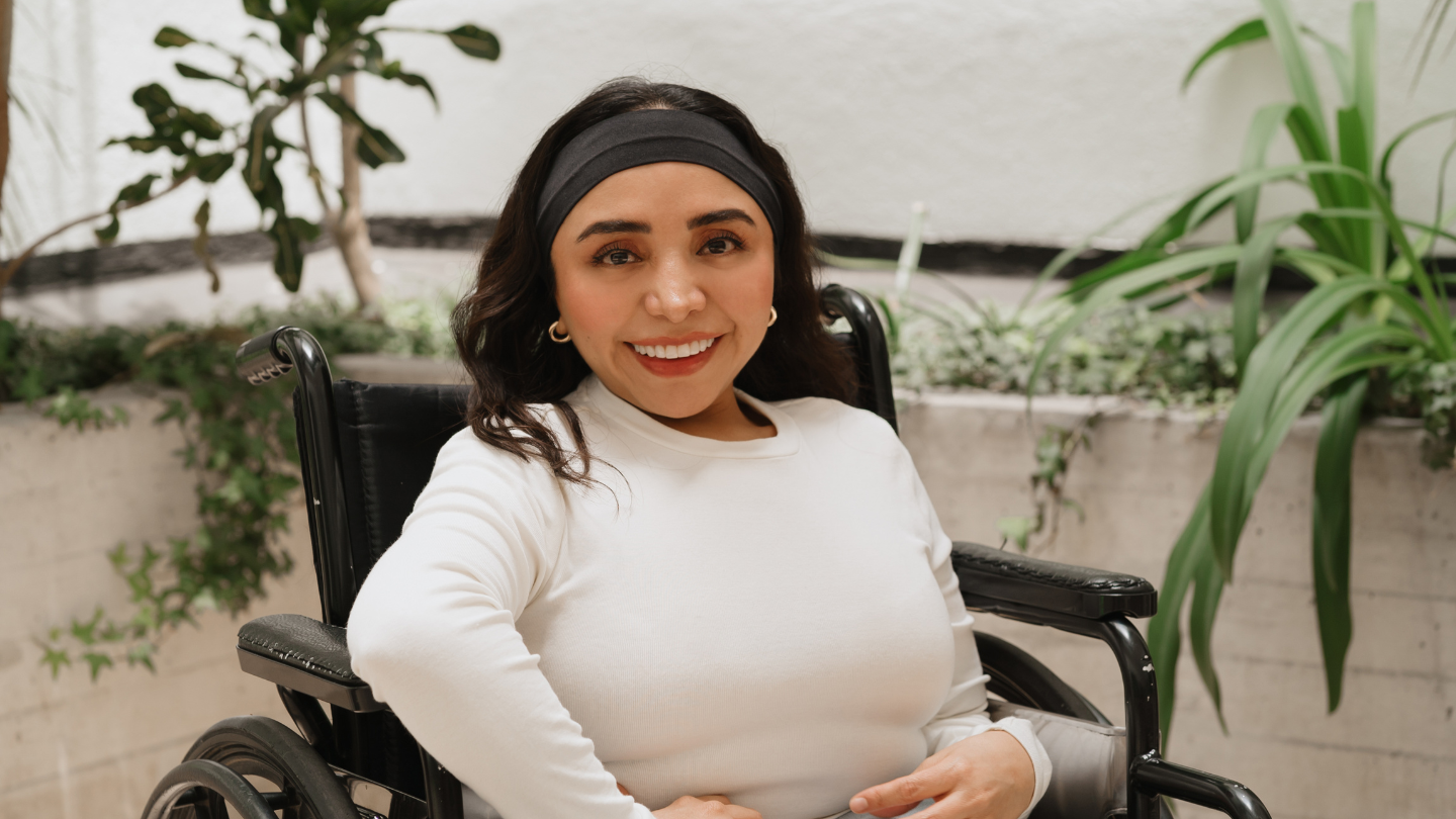 other access methods young female in wheelchair smiling