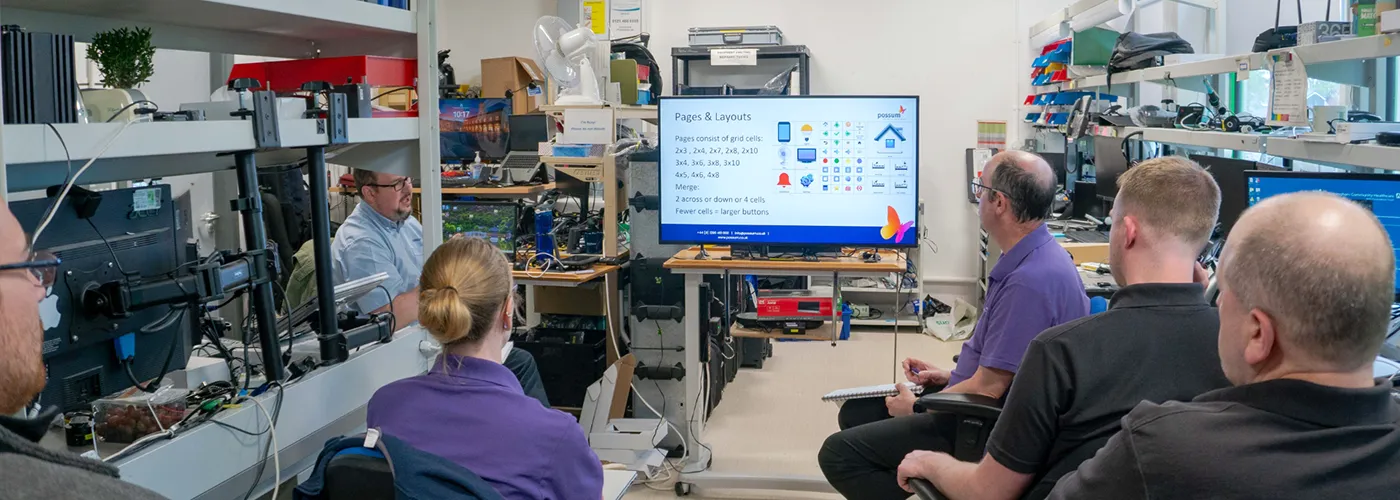 Possum Team Training and Innovation Possum team delivering assistive technology training and product development in the company’s workshop