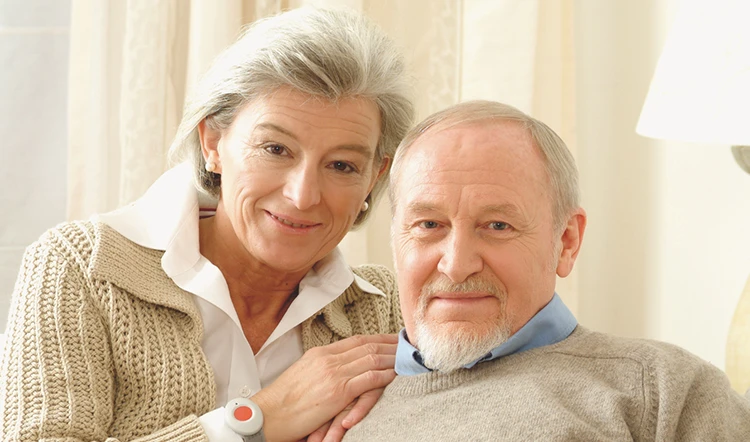 Older couple using a Possum telecare solution to support safer, more independent living at home